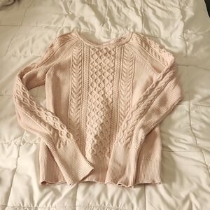 Women's medium gap crewneck sweater in pink.